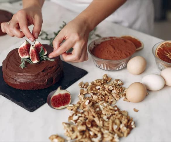 chef prepares chocolate cake